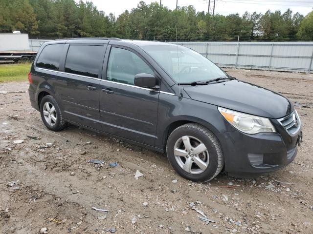 2V4RW3DG7BR766711 - 2011 VOLKSWAGEN ROUTAN SE BLACK photo 4