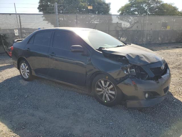 1NXBU4EE2AZ200070 - 2010 TOYOTA COROLLA BASE შავი ფოტო 4