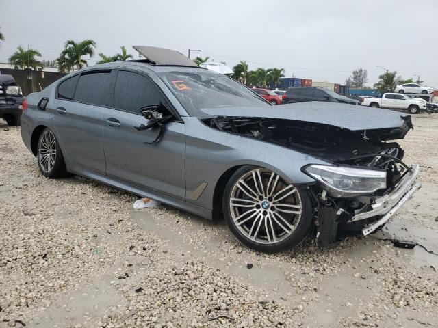 WBAJB9C52KB464437 - 2019 BMW M550XI GRAY photo 4