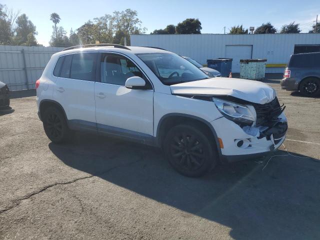 WVGAV7AX4BW536780 - 2011 VOLKSWAGEN TIGUAN S WHITE photo 4