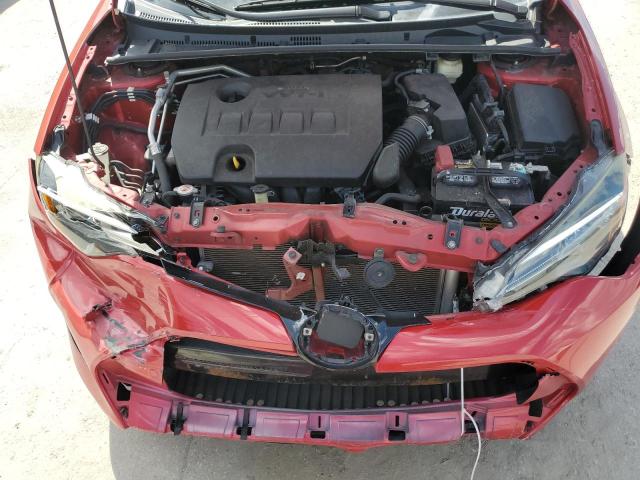 5YFBURHE1JP843777 - 2018 TOYOTA COROLLA L RED photo 11