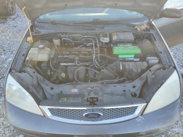 1FAFP34N15W112605 - 2005 FORD FOCUS ZX4 GRAY photo 11