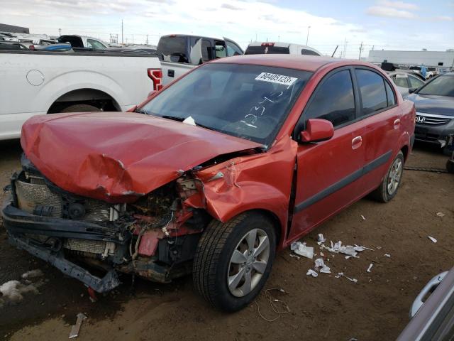 KNADE223696466979 - 2009 KIA RIO BASE ORANGE photo 1