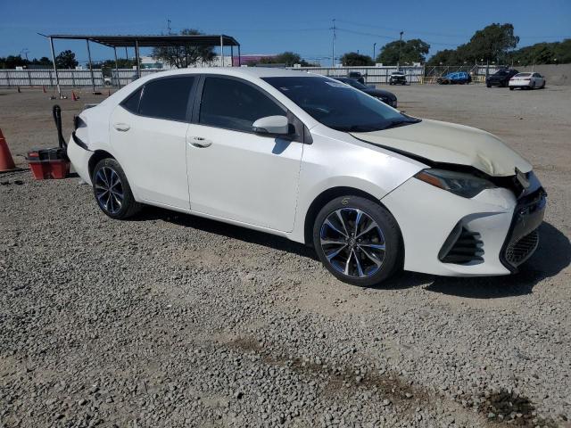 5YFBURHE8KP892783 - 2019 TOYOTA COROLLA L თეთრი ფოტო 4