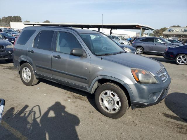 JHLRD68565C010930 - 2005 HONDA CR-V LX GRAY photo 4