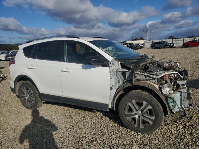 JTMBFREV5HJ171297 - 2017 TOYOTA RAV4 LE WHITE photo 4