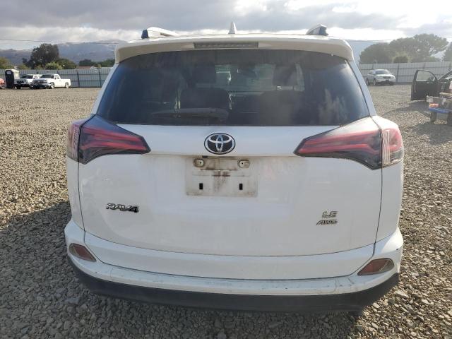 JTMBFREV5HJ171297 - 2017 TOYOTA RAV4 LE WHITE photo 6