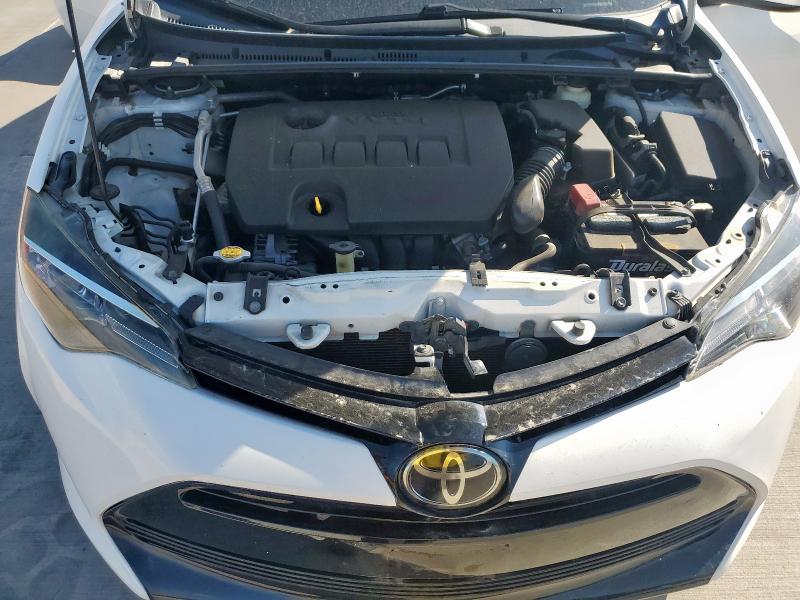5YFBURHE2HP656476 - 2017 TOYOTA COROLLA L თეთრი ფოტო 11