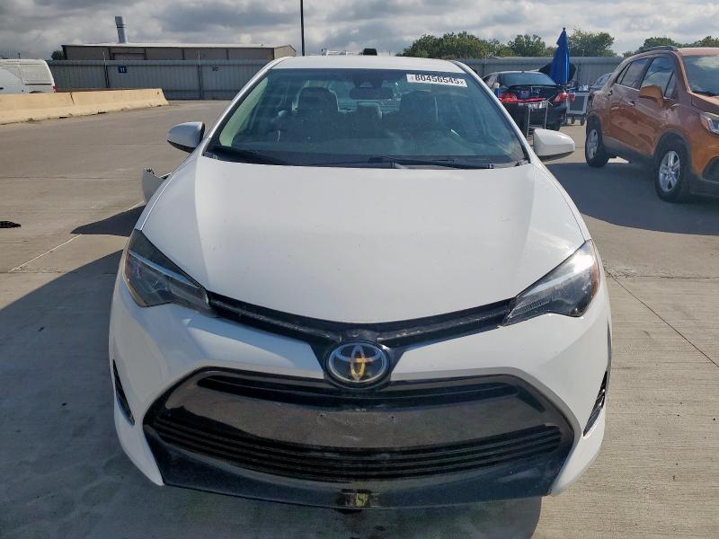 5YFBURHE2HP656476 - 2017 TOYOTA COROLLA L თეთრი ფოტო 5