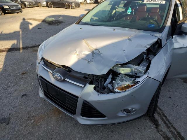 1FAHP3H22CL283693 - 2012 FORD FOCUS SEL SILVER photo 11