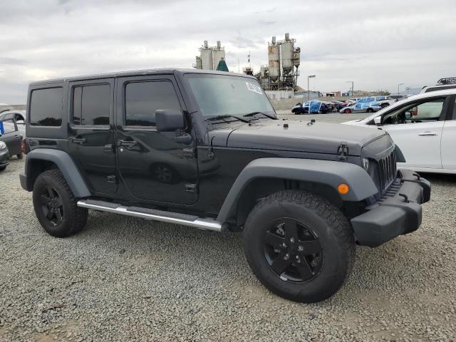1C4HJWDG9EL113252 - 2014 JEEP WRANGLER U SPORT 黑色 照片 4