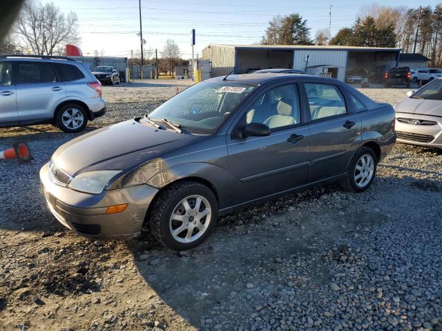 1FAFP34N95W244348 - 2005 FORD FOCUS ZX4 GRAY photo 1