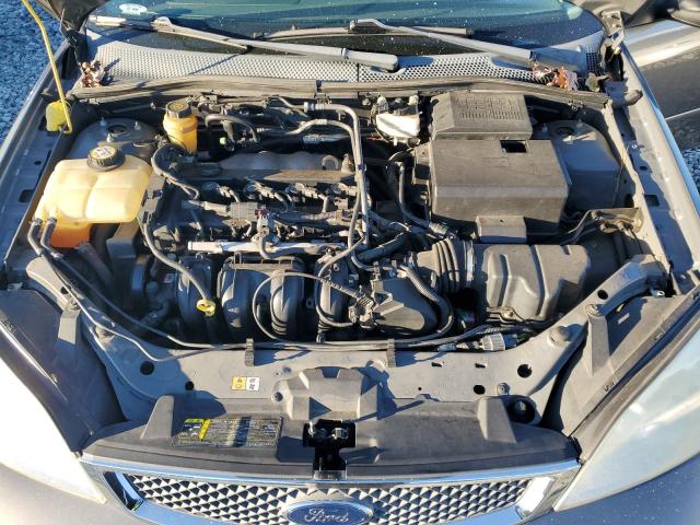 1FAFP34N95W244348 - 2005 FORD FOCUS ZX4 GRAY photo 11