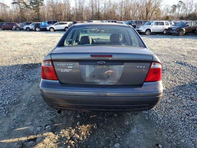 1FAFP34N95W244348 - 2005 FORD FOCUS ZX4 GRAY photo 6