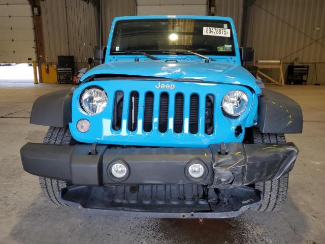 1C4BJWDGXJL855871 - 2018 JEEP WRANGLER U SPORT Bleu photo 5