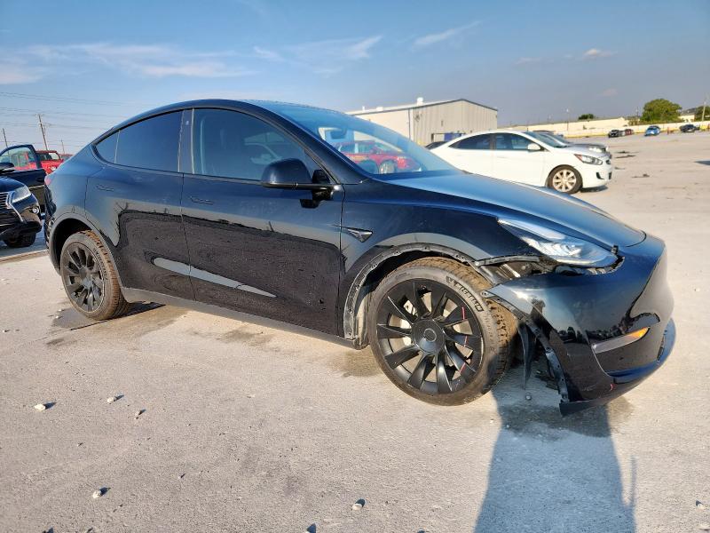 7SAYGDEE0PA107782 - 2023 TESLA MODEL Y Schwarz Foto 4