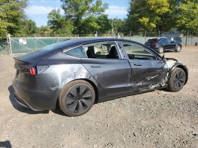5YJ3E1EA9SF029703 - 2025 TESLA MODEL 3 BLACK photo 3