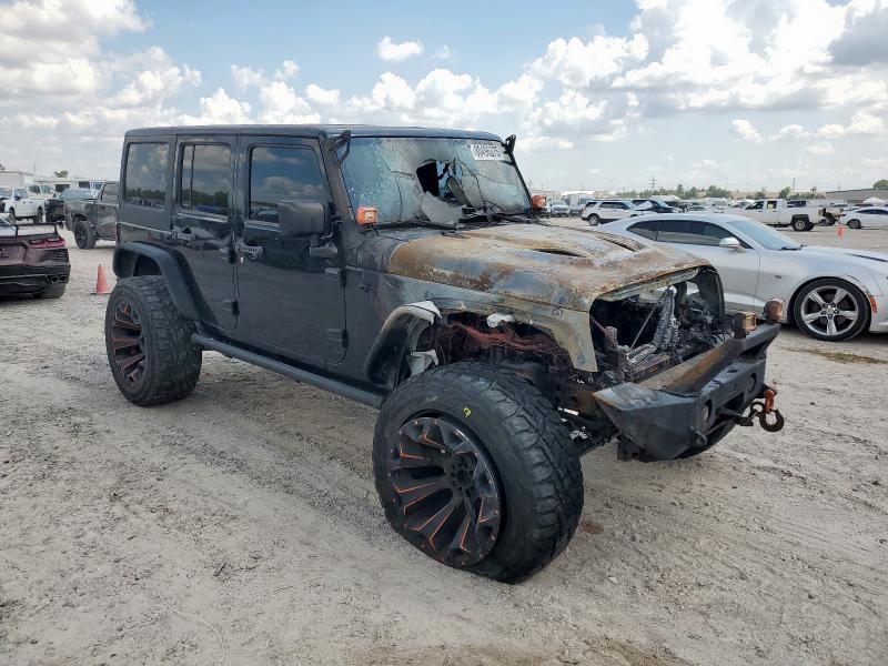 1C4BJWDGXGL202028 - 2016 JEEP WRANGLER U SPORT BLACK photo 4