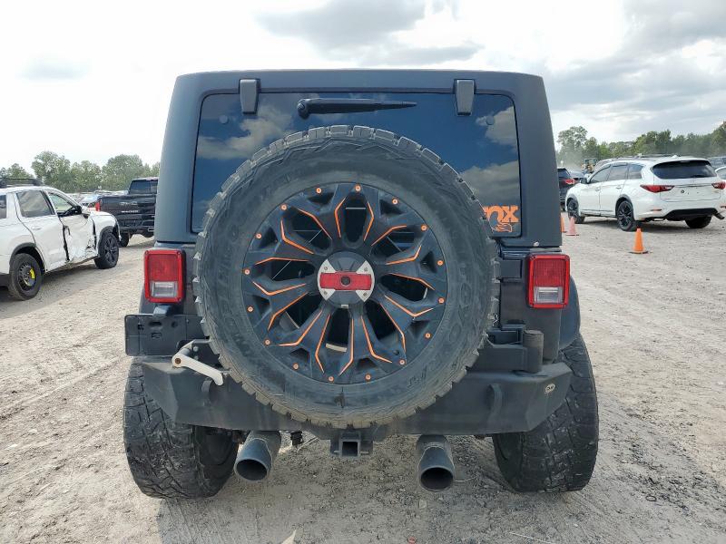 1C4BJWDGXGL202028 - 2016 JEEP WRANGLER U SPORT BLACK photo 6