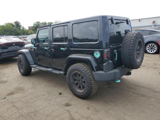 1C4HJWEGXDL588647 - 2013 JEEP WRANGLER UNLIMITED SAHARA Schwarz Foto 2