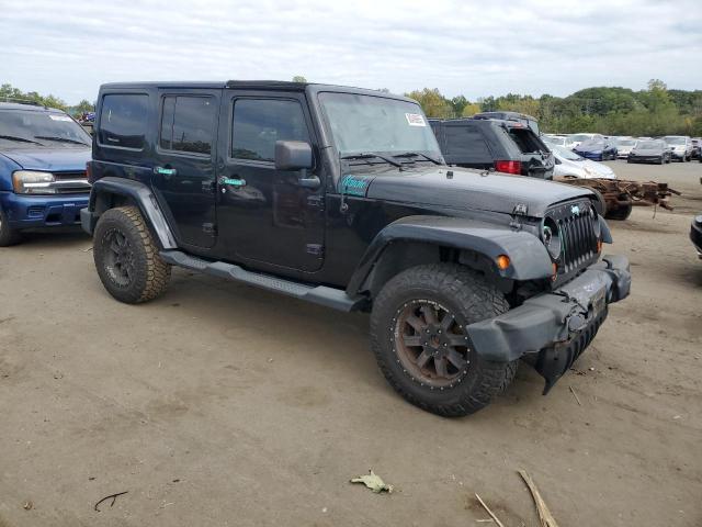 1C4HJWEGXDL588647 - 2013 JEEP WRANGLER UNLIMITED SAHARA Schwarz Foto 4