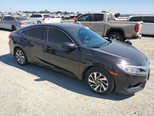 2HGFC2F7XGH543011 - 2016 HONDA CIVIC EX BLACK photo 4