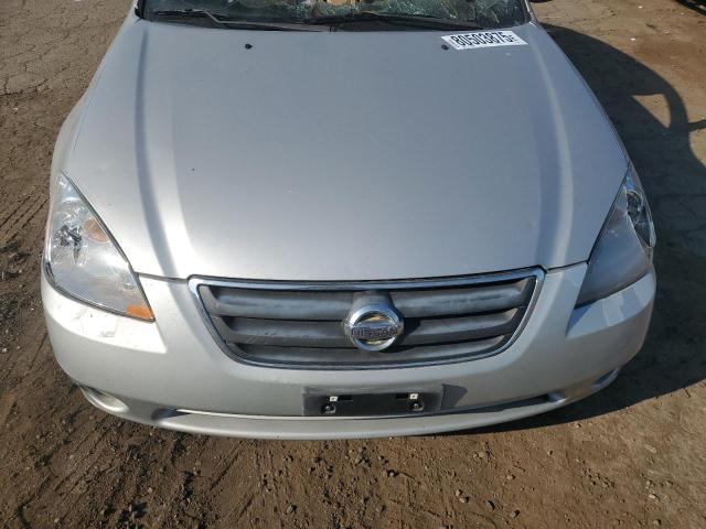 1N4AL11D03C340230 - 2003 NISSAN ALTIMA BASE ვერცხლისფერი ფოტო 11