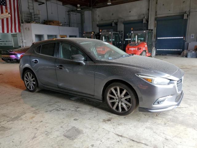 JM1BN1M30H1144495 - 2017 MAZDA 3 GRAND TOURING رمادي صورة 4