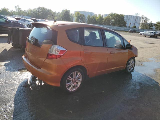 JHMGE8H67AC020669 - 2010 HONDA FIT SPORT ORANGE photo 3