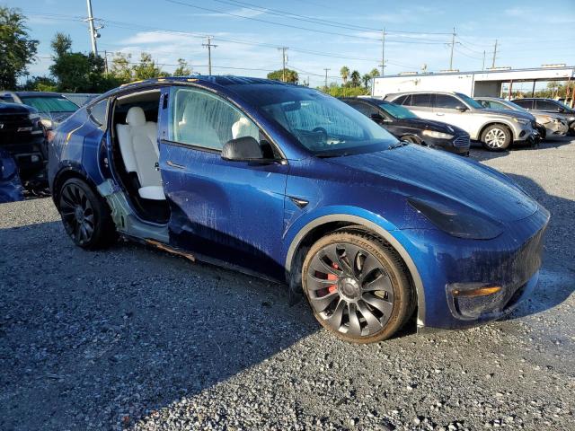 7SAYGDEF3PF697309 - 2023 TESLA MODEL Y Blau Foto 4
