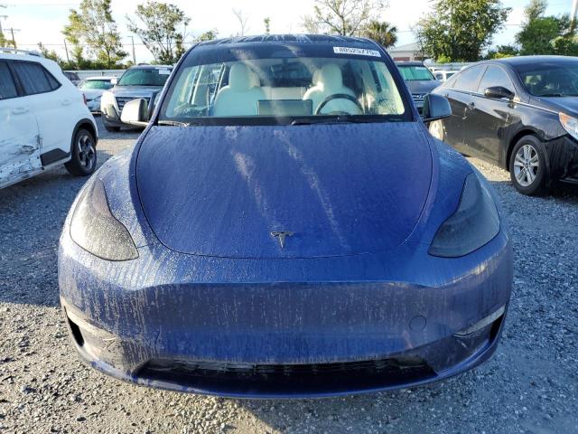 7SAYGDEF3PF697309 - 2023 TESLA MODEL Y Blau Foto 5