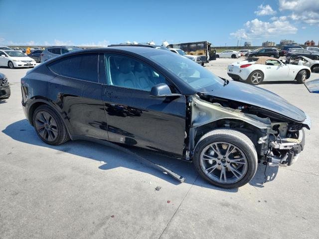 7SAYGAEE7SF245152 - 2025 TESLA MODEL Y BLACK photo 4