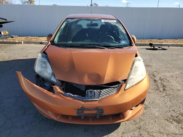 JHMGE8H50BC013071 - 2011 HONDA FIT SPORT ORANGE photo 5