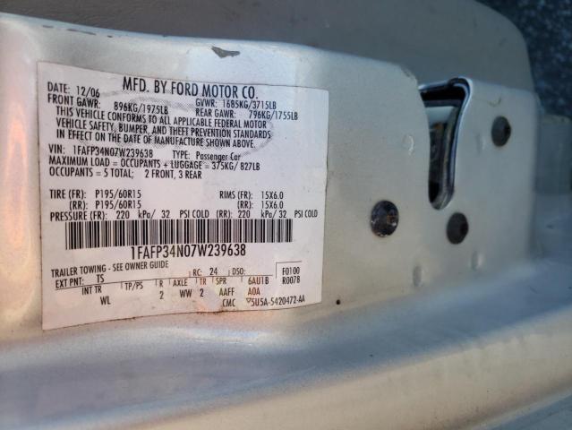 1FAFP34N07W239638 - 2007 FORD FOCUS ZX4 SILVER photo 12