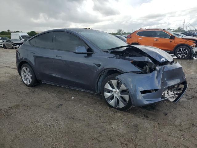 7SAYGDEE4PA168102 - 2023 TESLA MODEL Y Gris photo 4