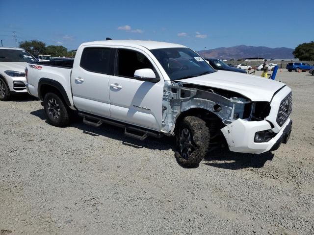 3TYCZ5AN5PT122472 - 2023 TOYOTA TACOMA DOUBLE CAB WHITE photo 4