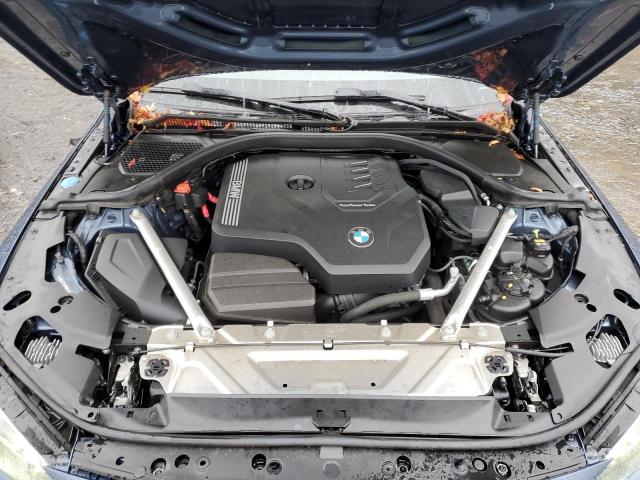 WBA73AP08MCG57585 - 2021 BMW 430XI BLUE photo 11