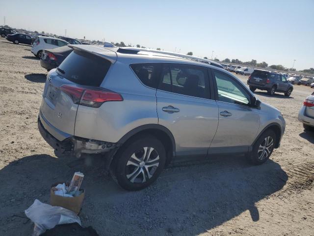 2T3BFREV5GW505098 - 2016 TOYOTA RAV4 LE SILVER photo 3