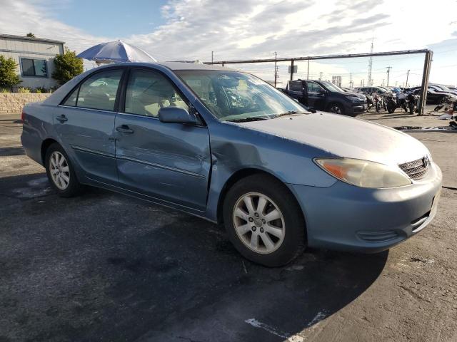 4T1BE30K12U536847 - 2002 TOYOTA CAMRY LE BLUE photo 4