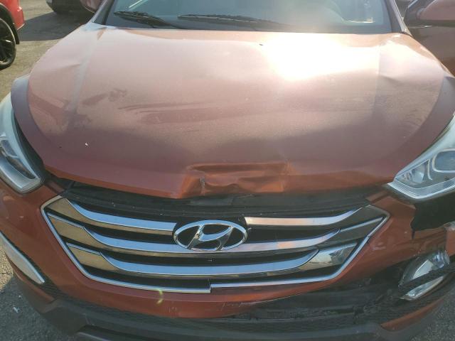 5XYZU3LB3GG333890 - 2016 HYUNDAI SANTA FE S ORANGE photo 12