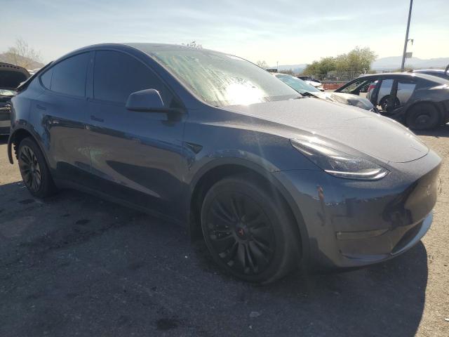 7SAYGDEE6PA107723 - 2023 TESLA MODEL Y ნაცრისფერი ფოტო 4