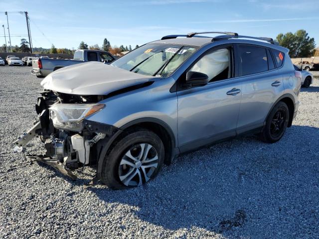 JTMZFREV1JJ204171 - 2018 TOYOTA RAV4 LE SILVER photo 1