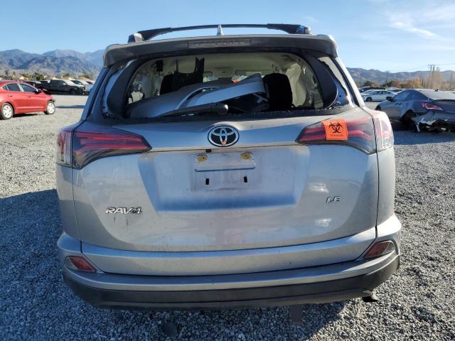 JTMZFREV1JJ204171 - 2018 TOYOTA RAV4 LE SILVER photo 6