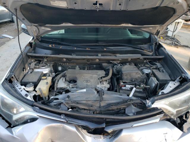 2T3ZFREV8GW311843 - 2016 TOYOTA RAV4 LE SILVER photo 11