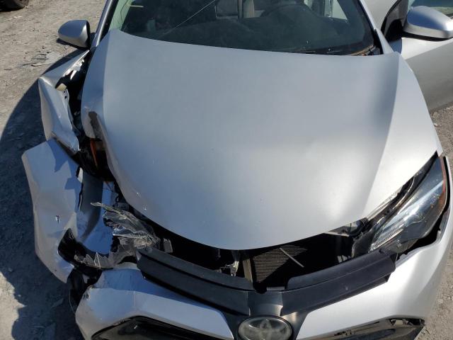 5YFBURHE1KP890440 - 2019 TOYOTA COROLLA L SILVER photo 11