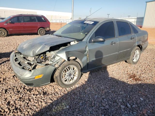 1FAFP34N45W229997 - 2005 FORD FOCUS ZX4 GRAY photo 1