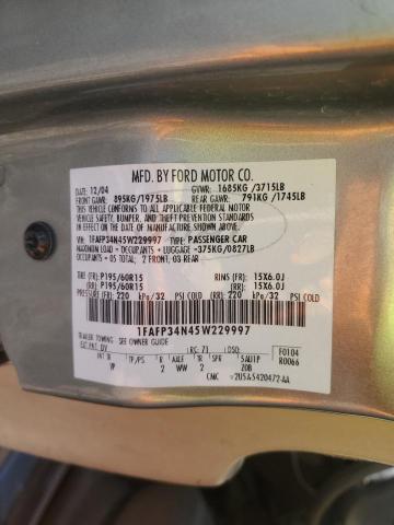 1FAFP34N45W229997 - 2005 FORD FOCUS ZX4 GRAY photo 12
