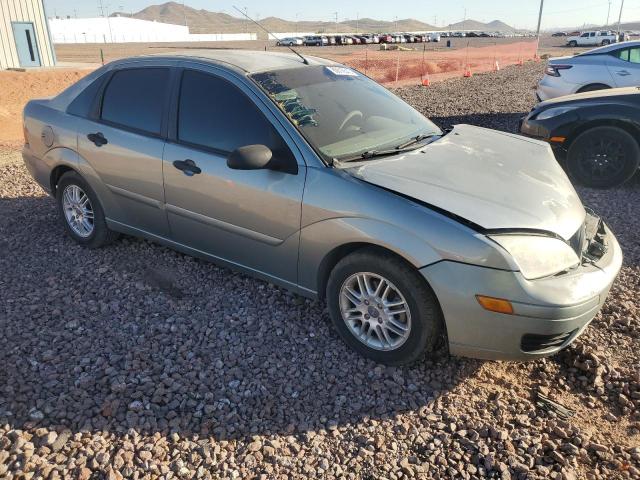 1FAFP34N45W229997 - 2005 FORD FOCUS ZX4 GRAY photo 4