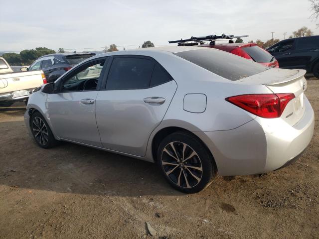 5YFBURHE6HP669960 - 2017 TOYOTA COROLLA L SILVER photo 2