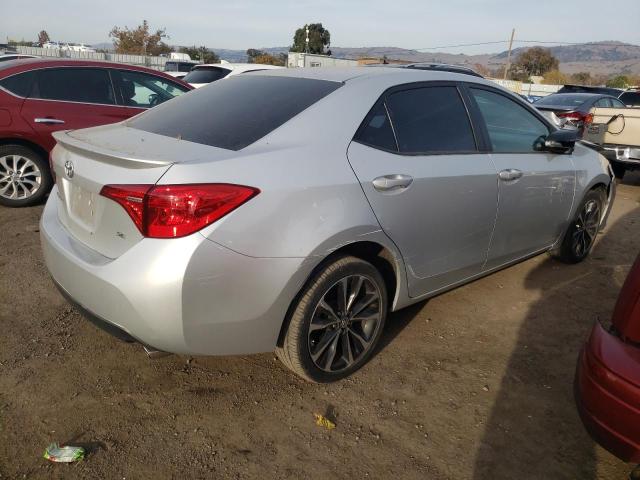 5YFBURHE6HP669960 - 2017 TOYOTA COROLLA L SILVER photo 3